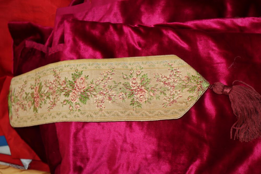 A silk Indian woven shawl, embroidered panel and table cover, various samples of brocade and damask